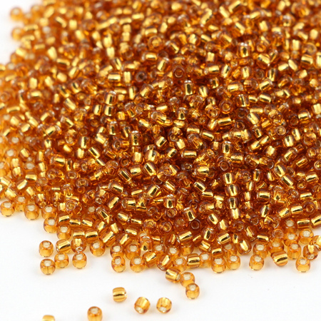 Toho Round 15/0 Silver-Lined Topaz [5g]