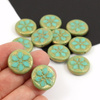 Szklana moneta z kwiatkiem Opaque Turquoise Green Gold Patina 18mm