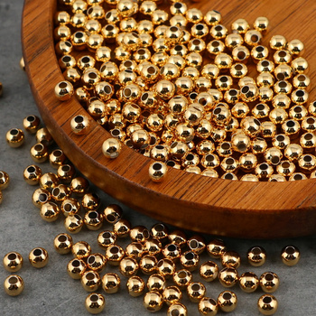 Przekładka kulka mosiądz pozłacany 4mm/1,5 [50szt]