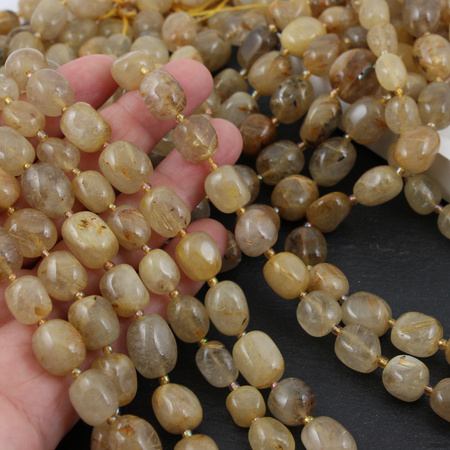 Kwarc ze złotym rutylem beczka oliwka 15x12mm