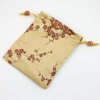 Woreczek żakardowy złoty z haftem kwiatowym 15x12cm