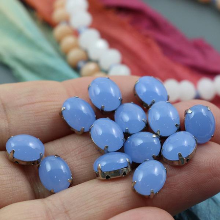 Kaboszon w oprawie owal niebieski 10x8mm