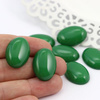 Kaboszon z żywicy owal zielony 25x18mm