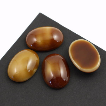 Kaboszon szklany Opaque Dk Topaz/White owal 25x18mm