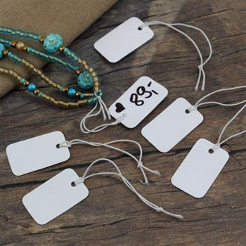 Metki z gumką do biżuterii biała 25x15mm [50szt]