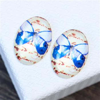 Kaboszon szklany z motylem owal 25x18mm