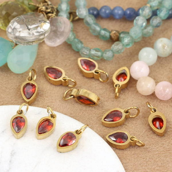 Stal szlachetna pozłacana PVD zawieszka brązowa w oprawie ZŁ 10x5mm