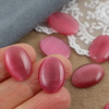 Kaboszon kocie oko owal malinowy 18x13mm