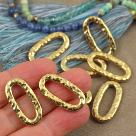 Łącznik nieregularny owal stal szlachetna pozłacana 26x14mm