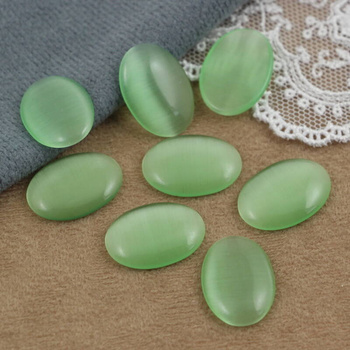 Kaboszon kocie oko owal miętowy 18x13mm