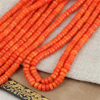 Koral pomarańczowy dysk 4x2mm [sznur 40cm]