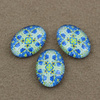 Kaboszon szklany z grafiką owal 18x13mm