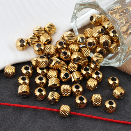 Przekładka kula fakturowana stal szlachetna pozłacana 5mm