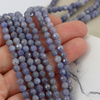 Tanzanit kula fasetowana 5mm [sznur 39cm]