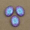 Kaboszon szklany z grafiką owal 18x13mm