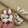 Perła seashell kropla biała 18x10mm