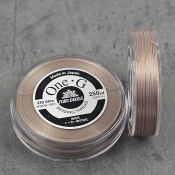One-G nici nylonowe beige 0,25mm [szpula 229m]