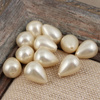 Perła seashell kropla kremowa 18x13mm