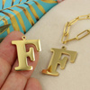 Zawieszka stal szlachetna pozłacana 25mm litera F