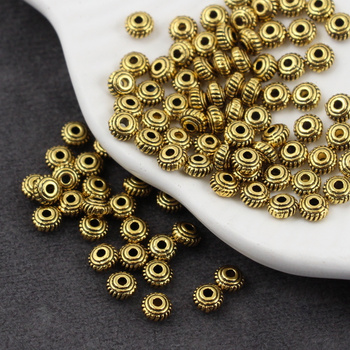 Przekładka metalowa stare złoto oponka 4,5x2,5mm [20szt]