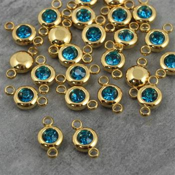 Stal szlachetna łącznik w oprawie ZŁ aquamarine 6mm