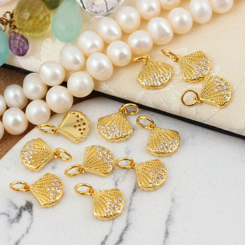 Zawieszka muszla z cyrkoniami mosiądz złocony 10mm