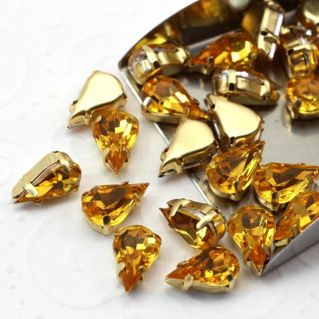 Kaboszon w oprawie łezka fasetowana żółta 13x8mm