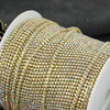 Taśma ozdobna cyrkoniowa gold/crystal AB 2mm [50cm]