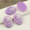 Kaboszon kamea z żywicy fioletowa 25x18mm