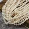 Perła słodkowodna kremowa nieregularna kula 6mm [sznur 35cm]