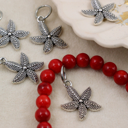 Zawieszka metalowa rozgwiazda srebrna 22x18mm