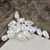 Perła seashell kropla biała 18x10mm