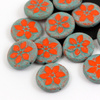 Szklana moneta z kwiatkiem Opaque Orange Turquoise 18mm