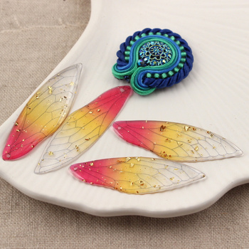 Akrylowa zawieszka skrzydło ważki czerwono-żółte 51x16mm