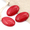 Kaboszon jadeit czerwony owal 30x20mm