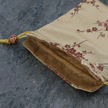 Woreczek żakardowy złoty z haftem kwiatowym 15x12cm