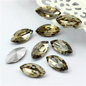 Kaboszon szklany wrzeciono fasetowane szampańskie 18x9mm