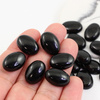 Kaboszon czarny agat owal 18x13mm