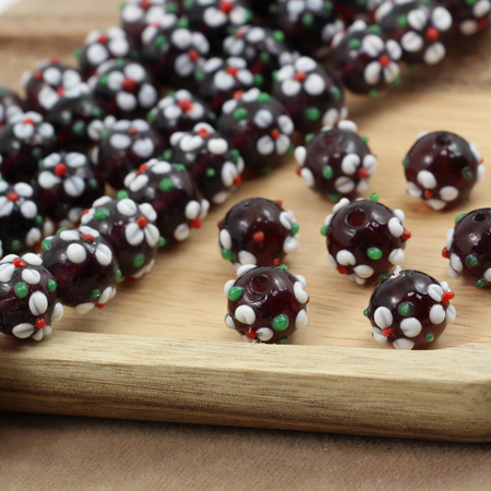 Koralik szklany w kwiatki ciemny fioletowy 13x12mm