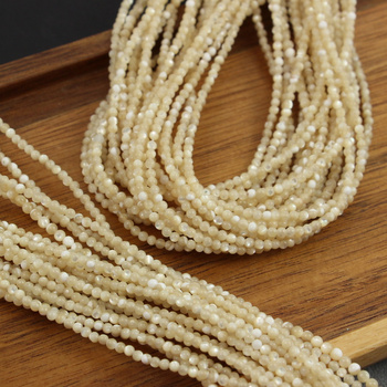 Muszla karmelowa kula gładka 2,5mm [sznur 39cm]