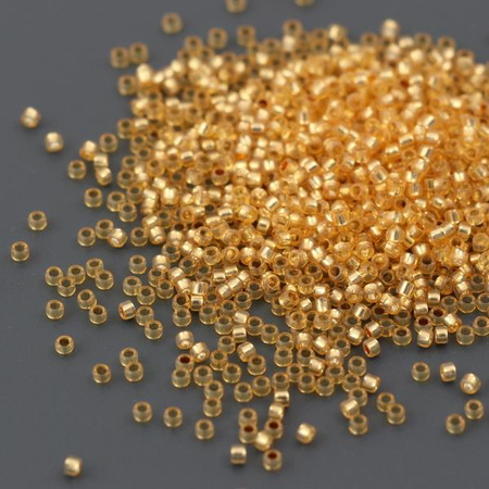 Toho Round 15/0 Silver-Lined Milky Lt. Topaz [5g]