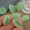 Kaboszon kocie oko owal miętowy 18x13mm