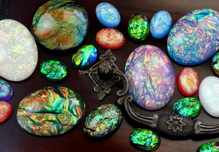 Kaboszon akrylowy owal aurora borealis brown 25x18mm