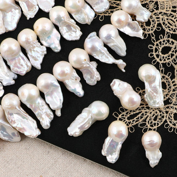 Perła słodkowodna baroque biała 25x10mm