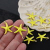Zawieszka rozgwiazda mosiądz złocony emalia limonka 22mm