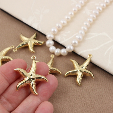 Zawieszka rozgwiazda mosiądz złocony 28mm