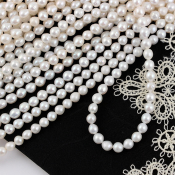 Perła słodkowodna biała kula 5-6mm [sznur 39cm]