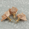 Kwiatek z perełką w tulejce nude 30mm