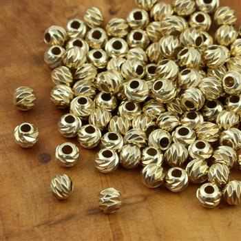 Kulka metalowa żłobiona złota 4mm