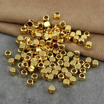 Metalowa przekładka kostka złota 4mm